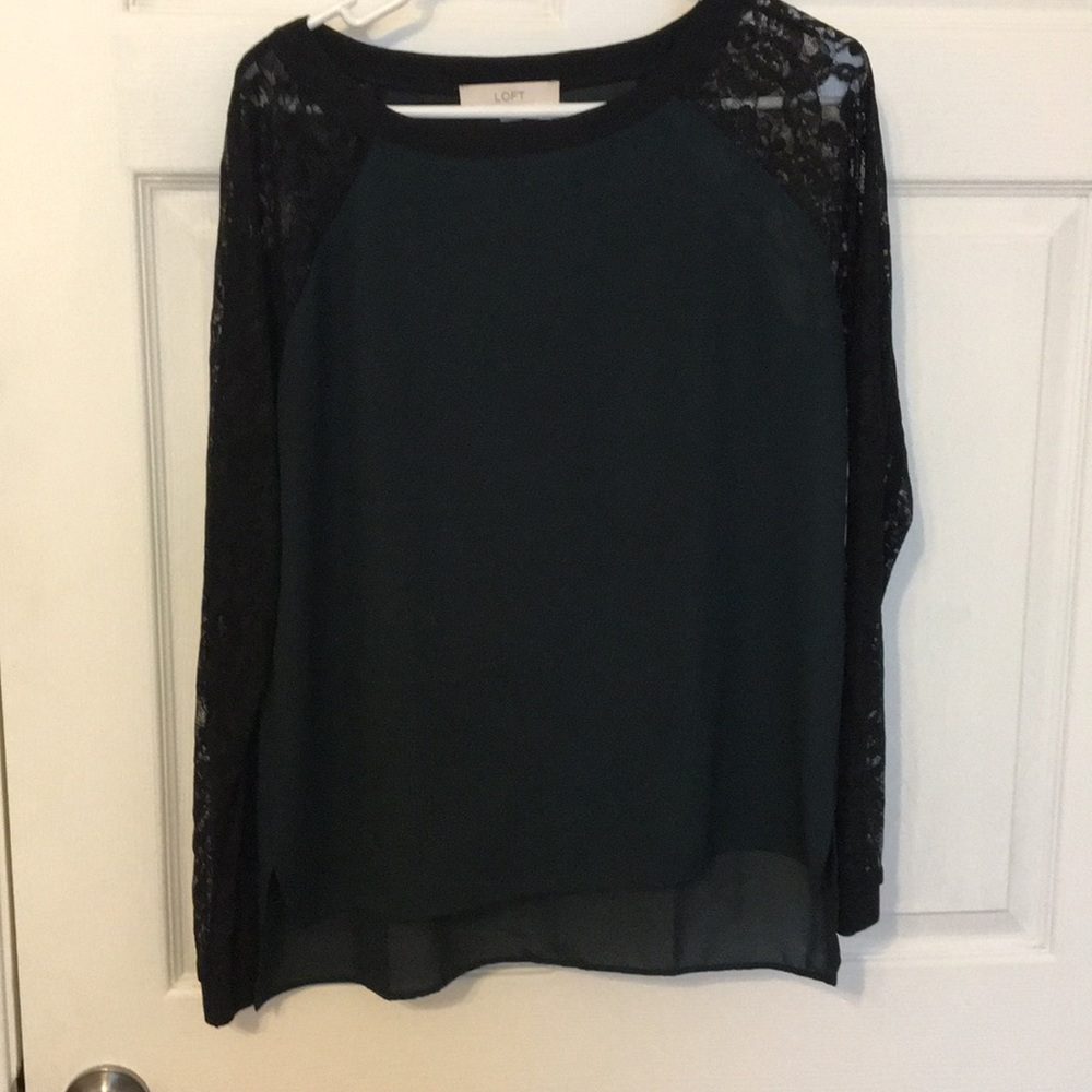 Green shirt with black lace sleeves